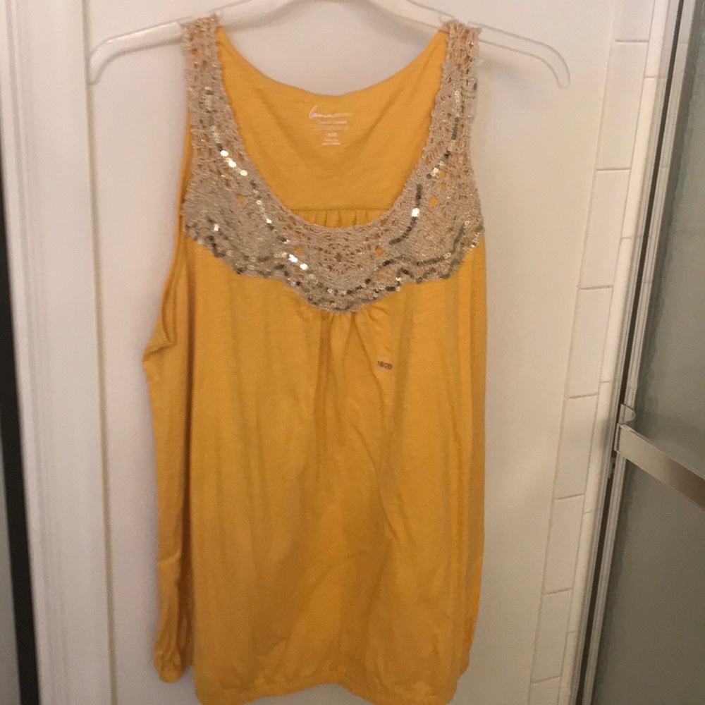 Gold sleeveless shirt